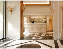 58957-photo-hotel-eden-roma-front-desk-with-lady-jpgjpg